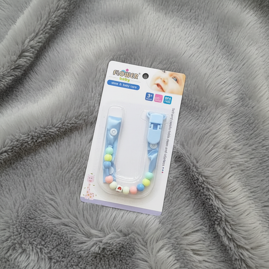 Blue Pacifier Clip on Grey Fur