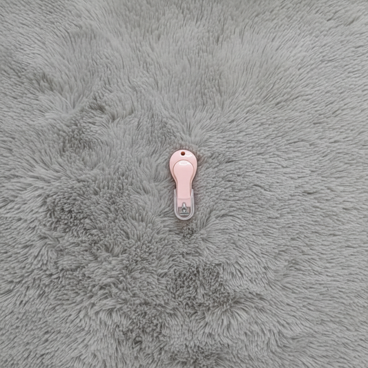 Pink Baby Nail Cutter on Grey Fur