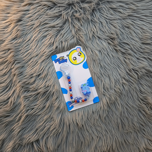 Blue Elephant Pacifier Chain Packaged on Grey Fur