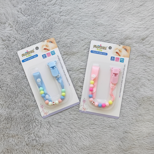 Blue & Pink Pacifier Clips on Grey Fur