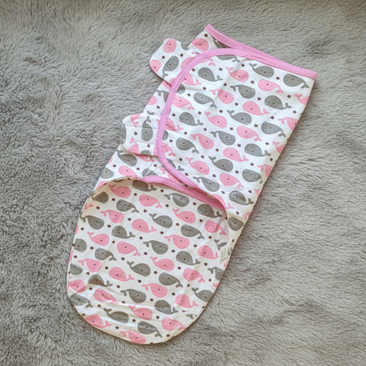 Pink & Grey Whale Swaddle on Grey Fur Blanket